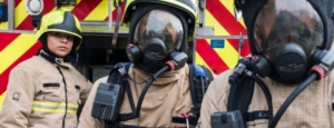 Strategic plan cover image of 1 female Firefighters and two others in breathing masks